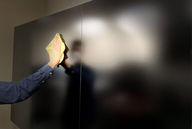 Cleaning a display with a microfiber cloth