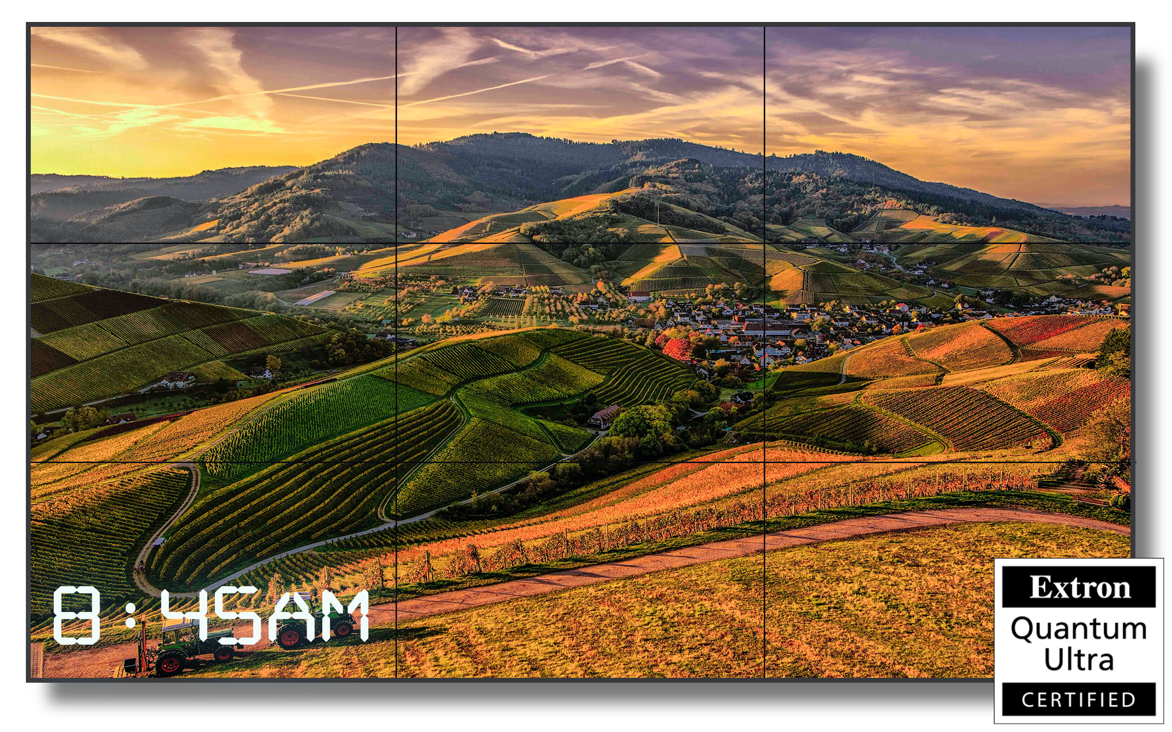 Three by three LCD video wall with an image of a rolling hills, a 8:45am timestamp and an extron quantum ultra certified icon.